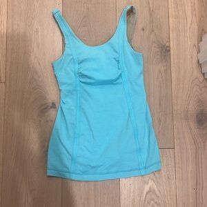 Blue Lululemon athletic tank.